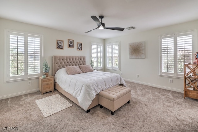 10294 Running Falls St, Las Vegas, NV 89178 - carpeted bedroom with multiple windows, baseboards, and ceiling fan