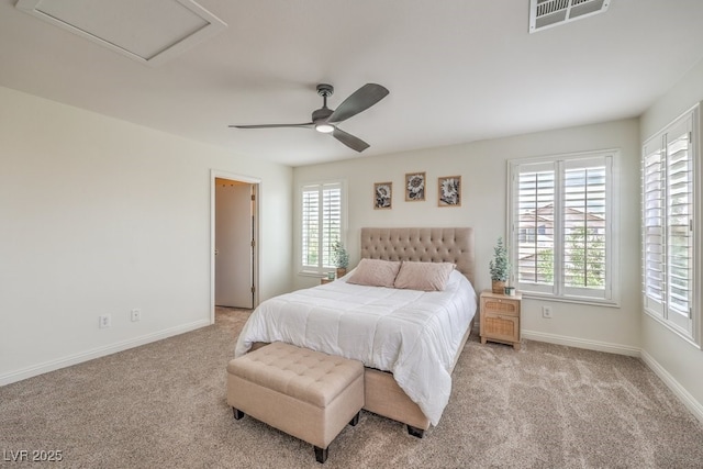 10294 Running Falls St, Las Vegas, NV 89178 - carpeted bedroom featuring multiple windows, baseboards, attic access, and a ceiling fan