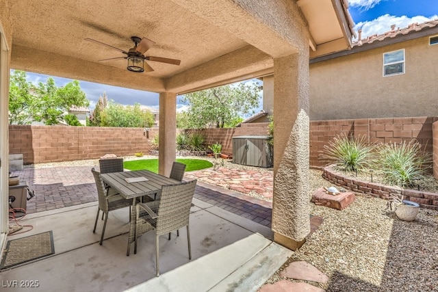 10294 Running Falls St, Las Vegas, NV 89178 - fenced backyard with a ceiling fan, a patio, and outdoor dining space