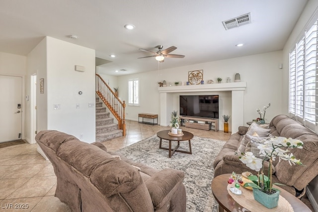 10294 Running Falls St, Las Vegas, NV 89178 - living area featuring a ceiling fan, stairway, recessed lighting, and tile patterned floors