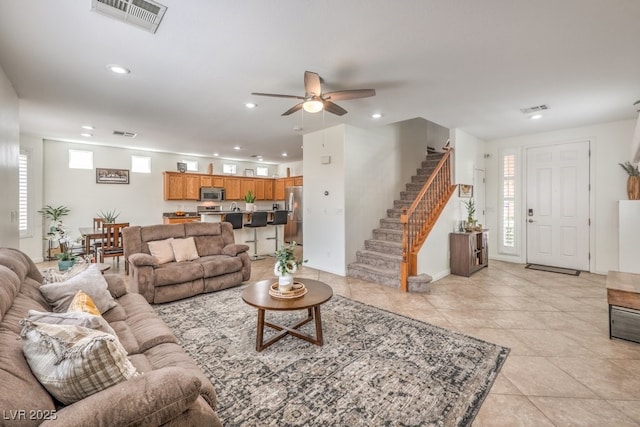10294 Running Falls St, Las Vegas, NV 89178 - living area with recessed lighting, a ceiling fan, stairs, and light tile patterned flooring