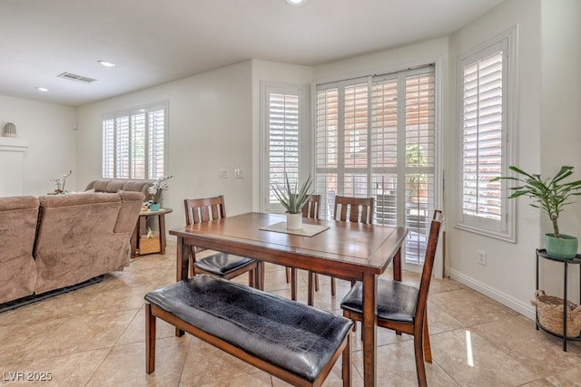 10294 Running Falls St, Las Vegas, NV 89178 - dining space with light tile patterned floors, recessed lighting, and baseboards