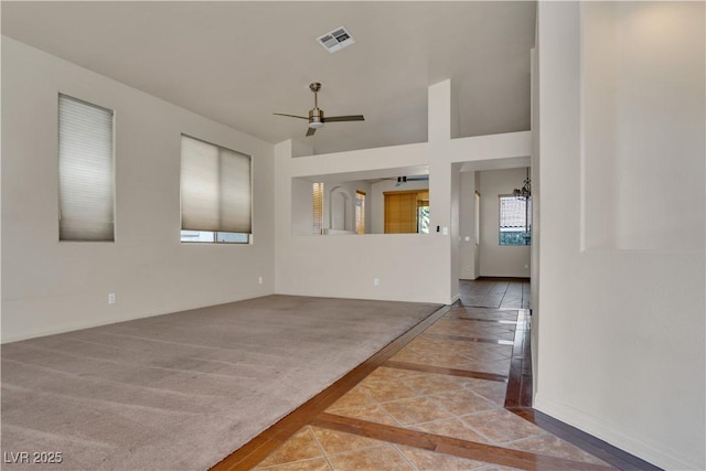 8940 Emery Lake St, Las Vegas, NV 89123 - unfurnished room with inlaid floor details, plenty of natural light, a ceiling fan, and baseboards