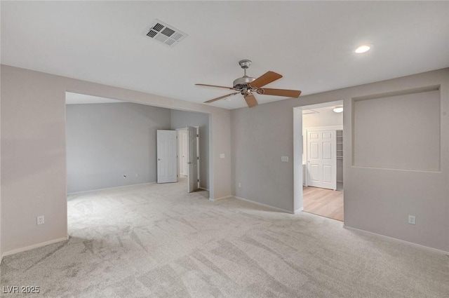 unfurnished bedroom featuring carpet flooring, baseboards, recessed lighting, and ceiling fan