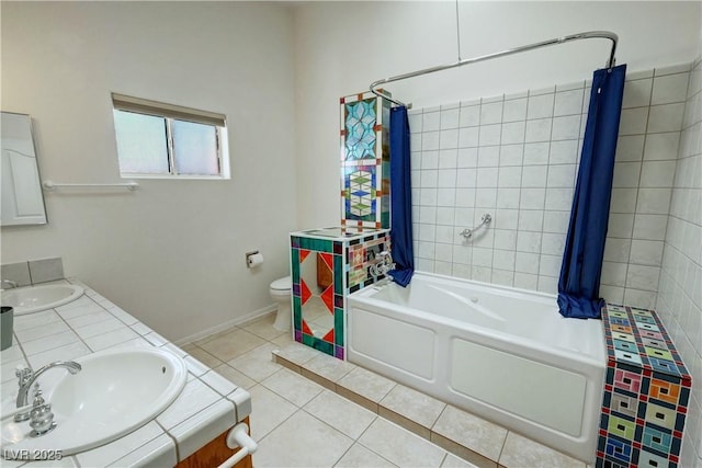 full bath featuring shower / tub combo with curtain, tile patterned flooring, double vanity, and a sink
