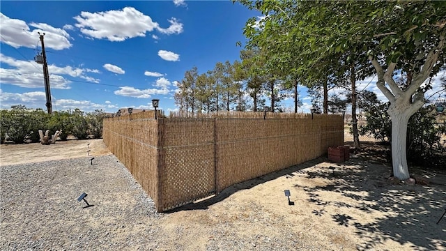 view of yard featuring fence