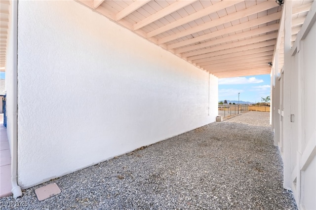 2650 Sagebrush Ave, Pahrump, NV 89048 - view of side of home with an attached carport and fence