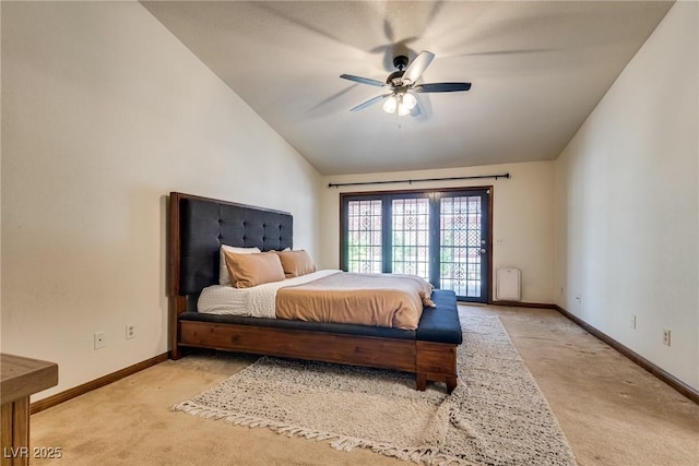 5242 Dickens Dr, Las Vegas, NV 89119 - bedroom with lofted ceiling, baseboards, ceiling fan, light carpet, and access to outside