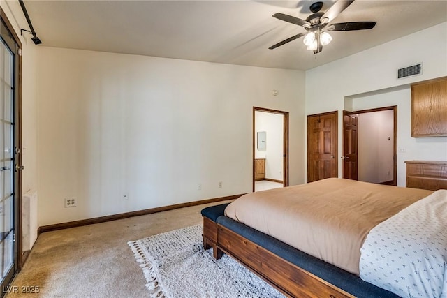 5242 Dickens Dr, Las Vegas, NV 89119 - bedroom featuring carpet, baseboards, ceiling fan, visible vents, and connected bathroom