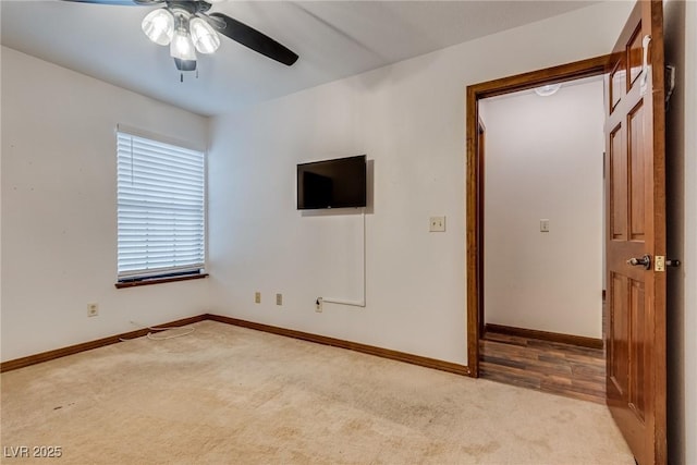5242 Dickens Dr, Las Vegas, NV 89119 - carpeted empty room with baseboards and ceiling fan