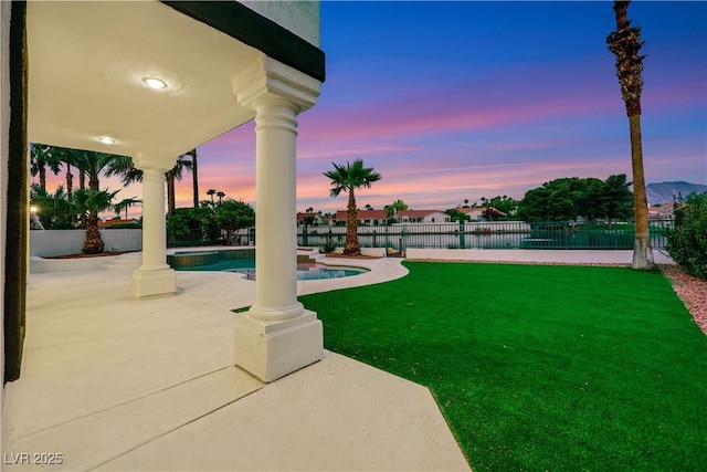 2589 Sun Reef Rd, Las Vegas, NV 89128 - fenced backyard featuring a patio