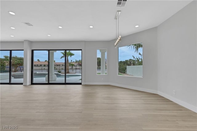 2589 Sun Reef Rd, Las Vegas, NV 89128 - spare room featuring recessed lighting and light wood-style flooring