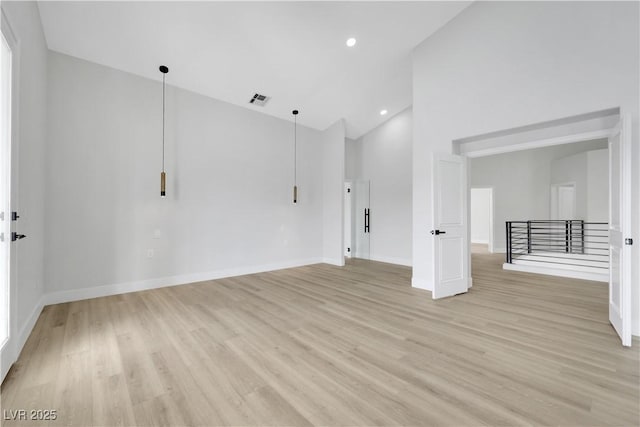 2589 Sun Reef Rd, Las Vegas, NV 89128 - spare room featuring light wood-style floors, high vaulted ceiling, and recessed lighting