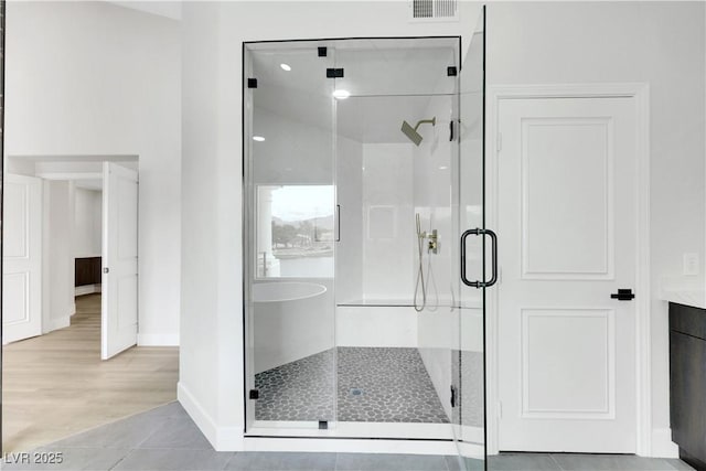 2589 Sun Reef Rd, Las Vegas, NV 89128 - bathroom with a shower stall and tile patterned floors