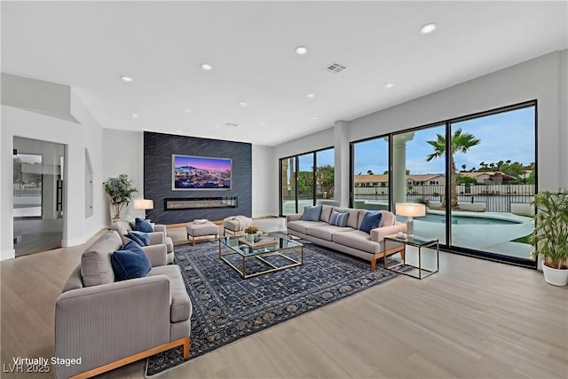 2589 Sun Reef Rd, Las Vegas, NV 89128 - living room with wood finished floors and recessed lighting