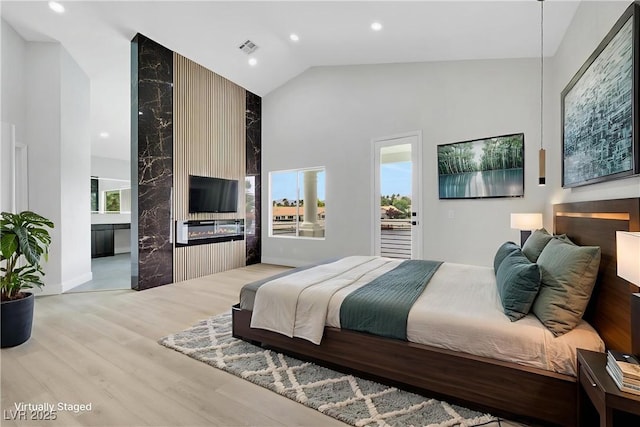 2589 Sun Reef Rd, Las Vegas, NV 89128 - bedroom with high vaulted ceiling, wood finished floors, and recessed lighting