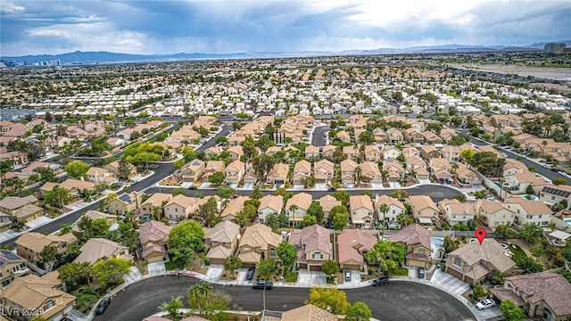 aerial view featuring a residential view and a mountain view