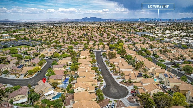 bird's eye view featuring a residential view and a mountain view