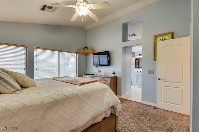 bedroom featuring light colored carpet, baseboards, ceiling fan, and visible vents