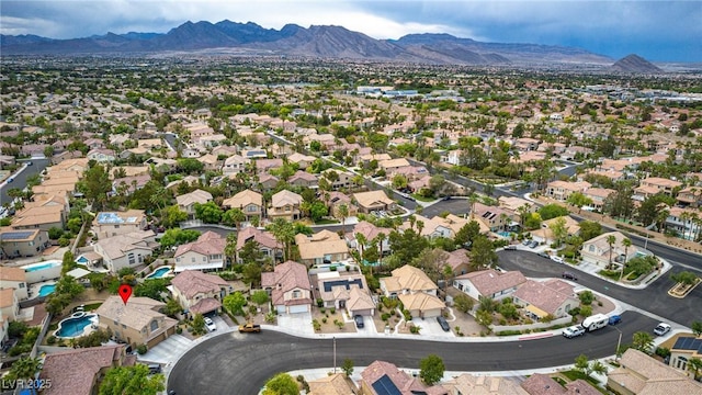 bird's eye view featuring a residential view and a mountain view