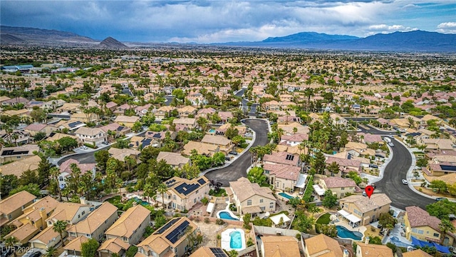drone / aerial view with a mountain view and a residential view