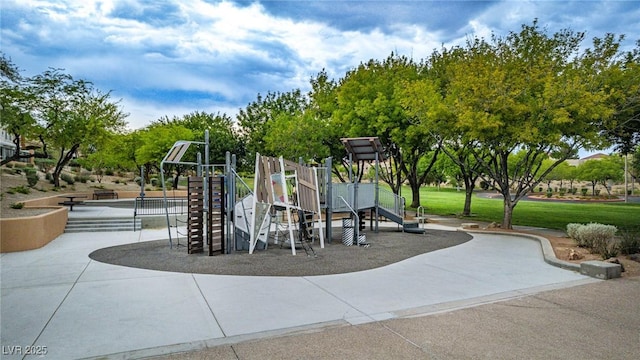 community jungle gym with a lawn