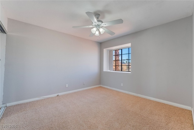 2046 Waverly Cir, Henderson, NV 89014 - carpeted spare room with baseboards and a ceiling fan