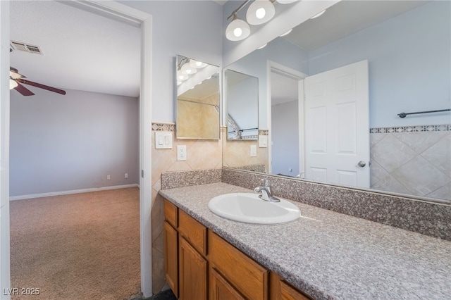2046 Waverly Cir, Henderson, NV 89014 - bathroom with ceiling fan, vanity, and baseboards
