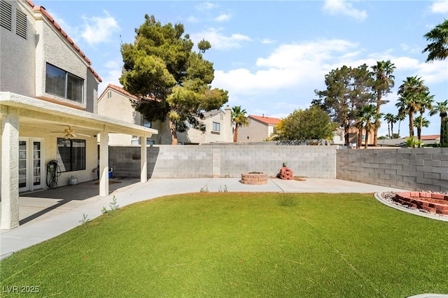2046 Waverly Cir, Henderson, NV 89014 - view of yard featuring a fire pit, a patio, and ceiling fan