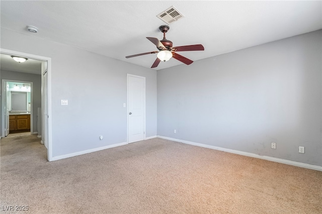2046 Waverly Cir, Henderson, NV 89014 - unfurnished bedroom featuring light carpet, baseboards, and ceiling fan