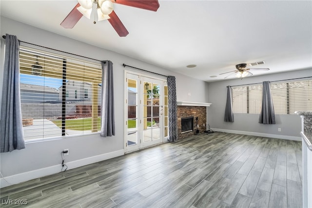 2046 Waverly Cir, Henderson, NV 89014 - unfurnished living room featuring ceiling fan, wood finished floors, and baseboards
