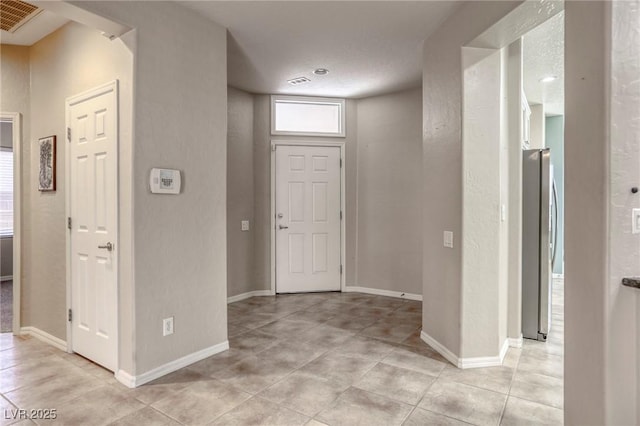 4124 Gliding Gulls Ave, North Las Vegas, NV 89084 - entryway featuring light tile patterned floors and baseboards