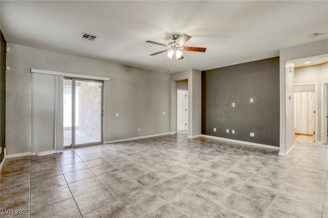 4124 Gliding Gulls Ave, North Las Vegas, NV 89084 - empty room with a ceiling fan, light tile patterned flooring, and baseboards
