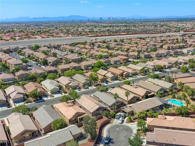 4124 Gliding Gulls Ave, North Las Vegas, NV 89084 - aerial perspective of suburban area featuring mountains