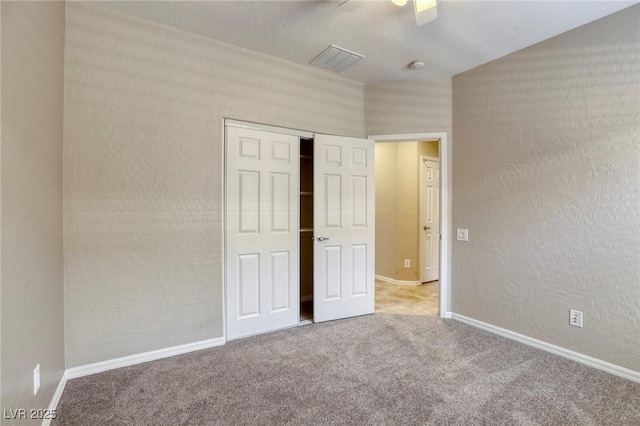 4124 Gliding Gulls Ave, North Las Vegas, NV 89084 - unfurnished bedroom with carpet flooring, baseboards, a closet, and a ceiling fan