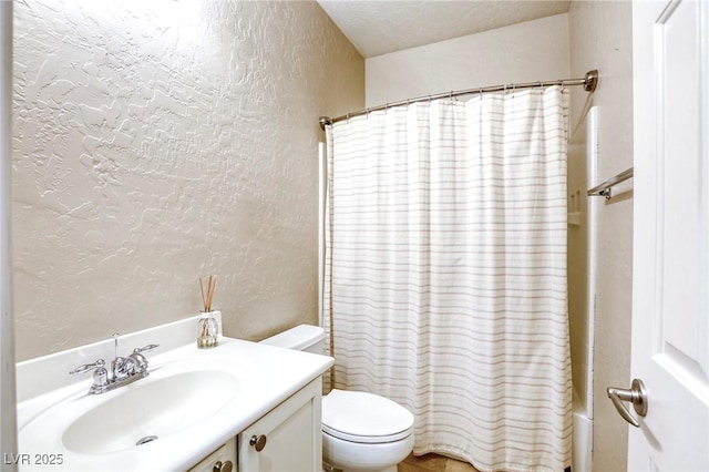 4124 Gliding Gulls Ave, North Las Vegas, NV 89084 - bathroom featuring toilet, a textured wall, vanity, and shower / bath combination with curtain