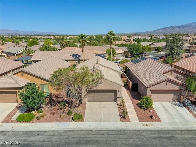 4124 Gliding Gulls Ave, North Las Vegas, NV 89084 - aerial perspective of suburban area with a mountain backdrop