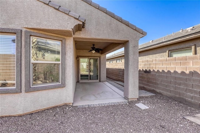 4124 Gliding Gulls Ave, North Las Vegas, NV 89084 - entrance to property with a ceiling fan, a patio area, and stucco siding