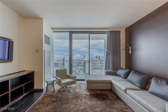 4381 W Flamingo Rd Unit 3818, Las Vegas, NV 89103 - living area featuring a city view and visible vents