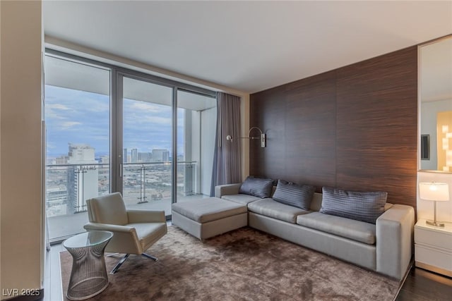 4381 W Flamingo Rd Unit 3818, Las Vegas, NV 89103 - living area featuring a city view and a wall of windows