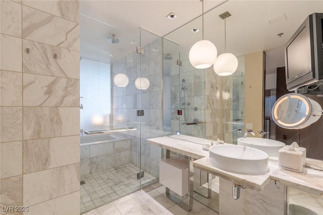 4381 W Flamingo Rd Unit 3818, Las Vegas, NV 89103 - bathroom featuring a sink, tile patterned flooring, and a shower stall