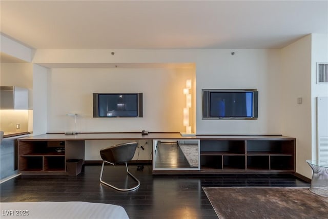 4381 W Flamingo Rd Unit 3818, Las Vegas, NV 89103 - living room featuring visible vents, wood finished floors, and baseboards