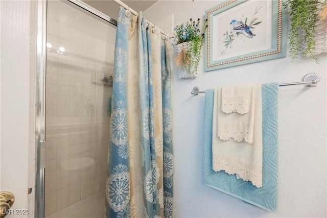 bathroom featuring a stall shower