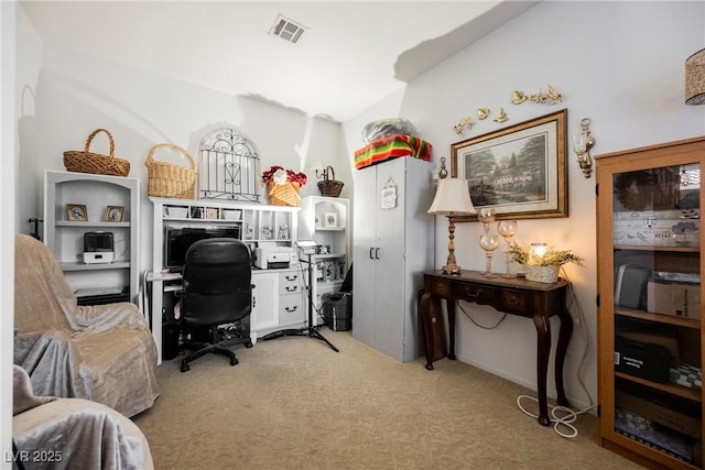 carpeted office space featuring visible vents