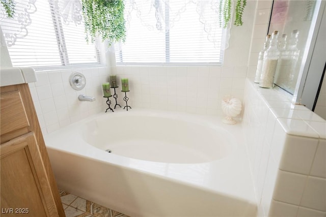 bathroom featuring a garden tub