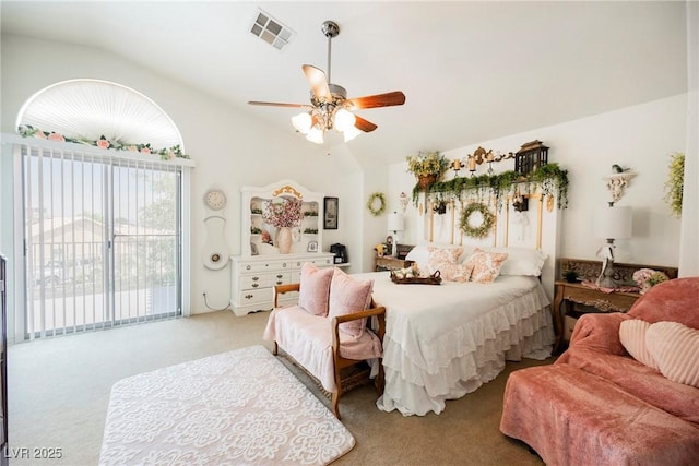 bedroom featuring ceiling fan, carpet flooring, visible vents, and vaulted ceiling