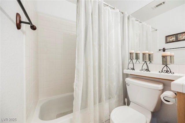 full bath featuring toilet, visible vents, and shower / bathtub combination with curtain