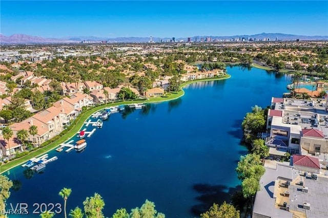 8404 Shore Breeze Dr, Las Vegas, NV 89128 - drone / aerial view of a water and mountain view