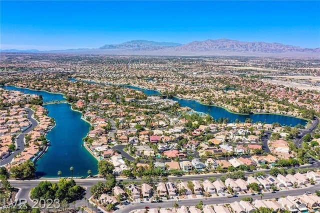 8404 Shore Breeze Dr, Las Vegas, NV 89128 - aerial view of residential area featuring a water and mountain view