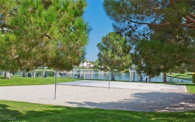 8404 Shore Breeze Dr, Las Vegas, NV 89128 - surrounding community with volleyball court, a yard, and a water view